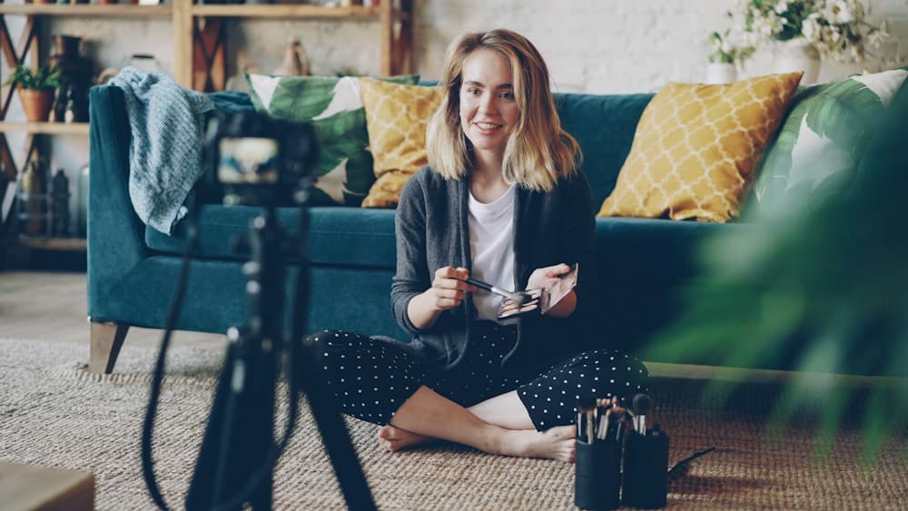 Content creator holding a camera
